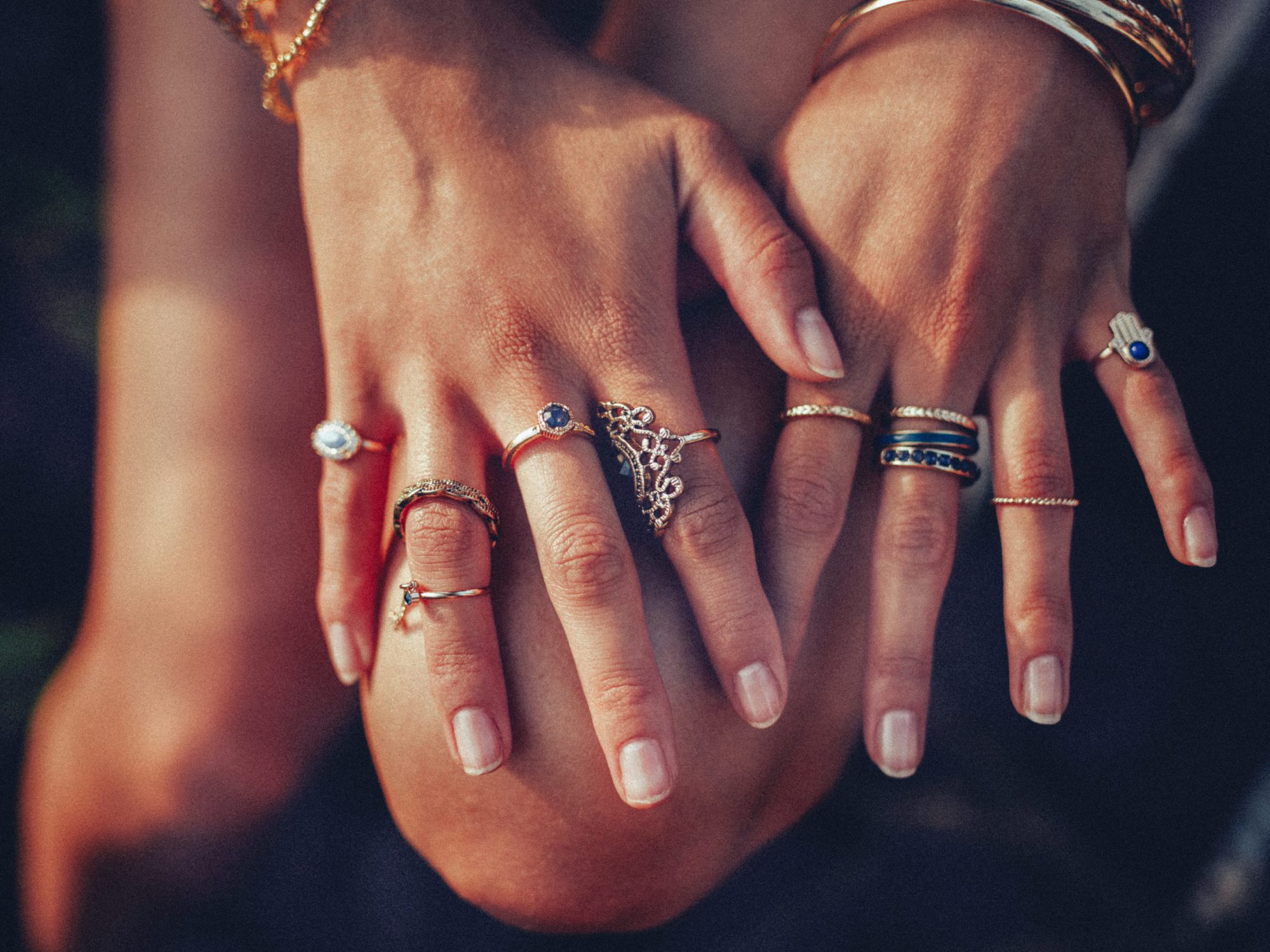 Hands wearing jewelry
