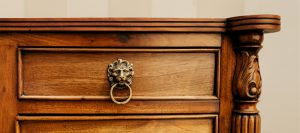 Detail of an antique chest, showing craftsmanship and sustainability