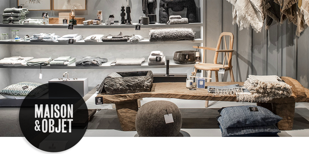 Maison & Objet exhibit displaying minimalist home décor, textiles, and artisan-crafted furniture.
