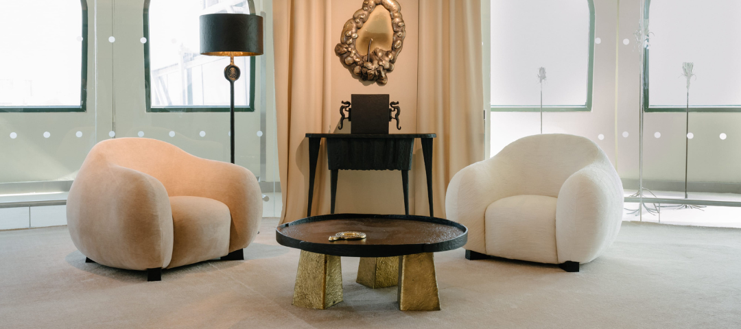Seating vignette at NOMAD Circle Hamptons showing sculptural chairs and collectible design pieces installed within an intimate residential interior.