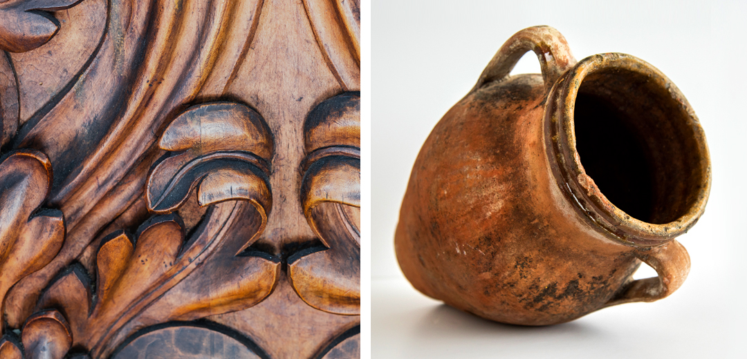 Close-up of carved wood detailing alongside an aged ceramic vessel, highlighting the craftsmanship, patina, and material evidence that help experts identify age, origin, and quality.