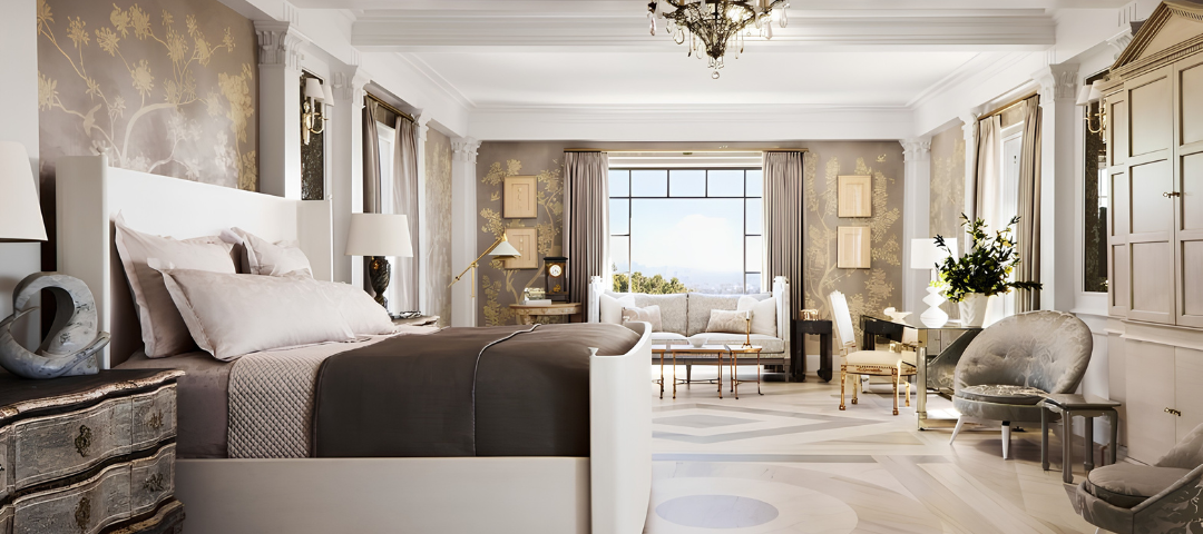 Bedroom with gold chinoiserie wall panels, a crystal chandelier, an antique painted commode, and patterned inlaid marble floors. Created by Mary McDonald.